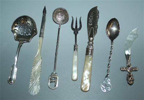 8 various silver implements including a mother of pearl handled pen